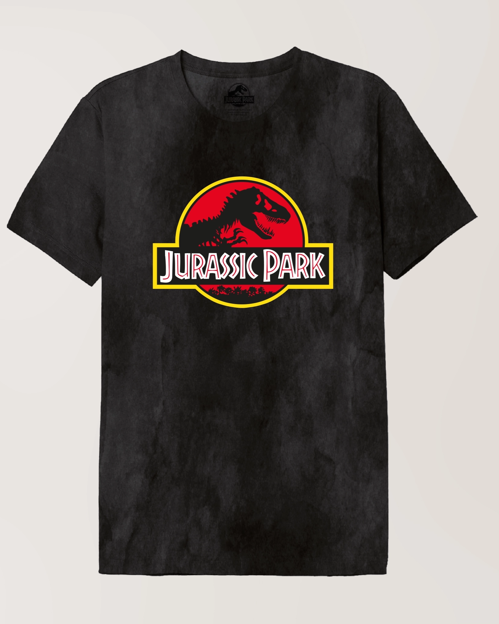 T-shirt noir effet stonewashed avec logo Jurassic Park rouge et jaune centré, style rétro sous licence officielle pour fans de cinéma.