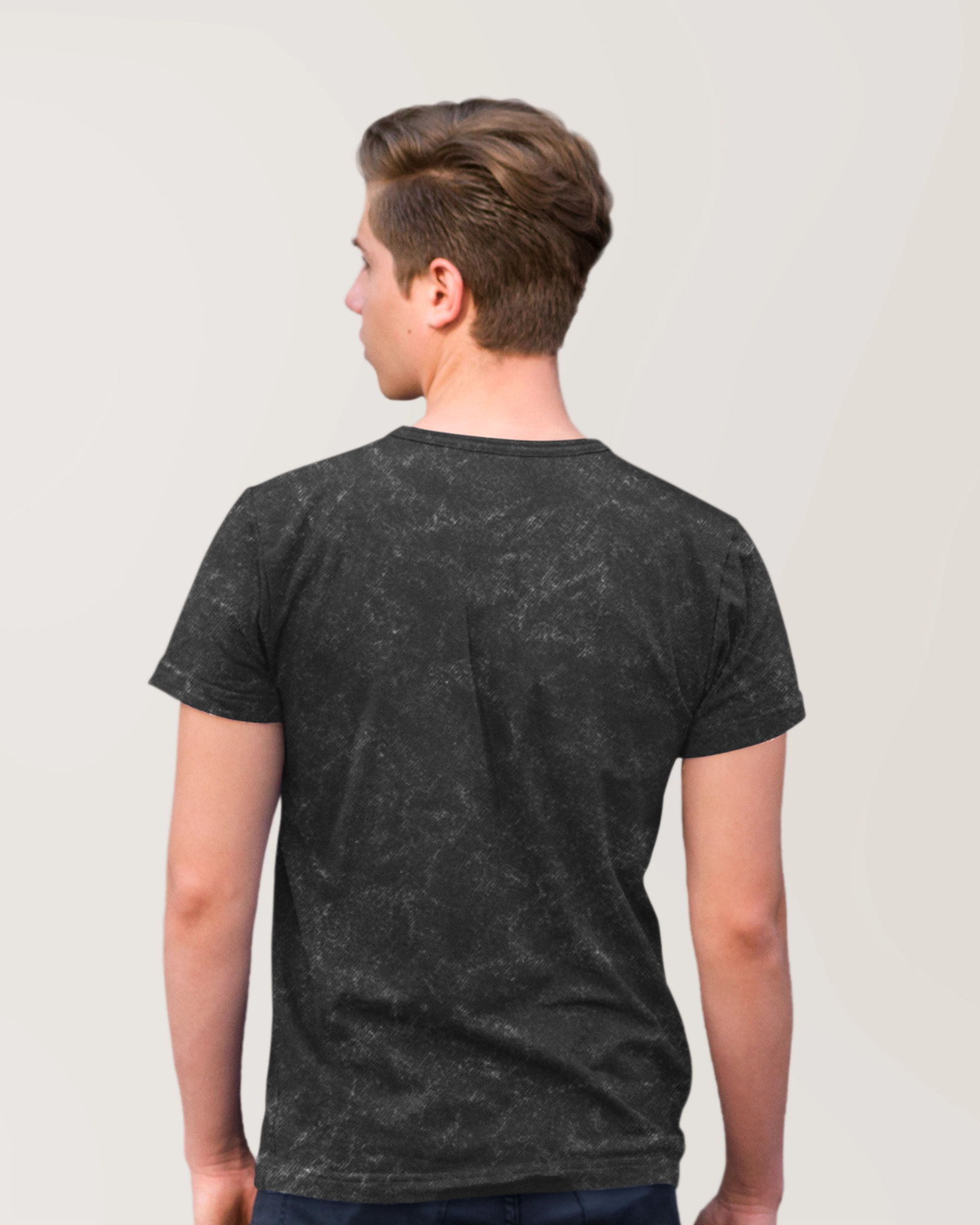 Vue arrière du T-shirt Jurassic Park stonewashed pour homme, sans motif, tissu noir effet délavé pour un style vintage.