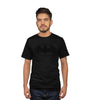 T-shirt BATMAN LOGO PUFF - DC Comics official porté par un homme, avec logo Batman en relief noir sur fond noir. Coupe classique pour homme.