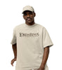 T-shirt oversize beige Le Seigneur des Anneaux avec logo 'The Fellowship of the Ring' imprimé sur la poitrine, style décontracté pour homme.